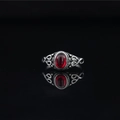Vintage oxidized silver ring featuring an oval red gemstone and intricate filigree patterns - US 6 / Red Gemstone Ring