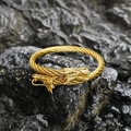 Ethnic stainless steel dragon head bangle with twisted cable texture in gold finish - Gold Color White Eyes