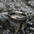 Multi-layer black leather bracelet with silver polished metal on dark rock background - Mirror Metal Bar Style / Black/Silver