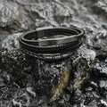 Bracciale multistrato in pelle intrecciata nera e acciaio al titanio con chiusura magnetica - Nero
