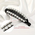 Detail of handmade black banana hair clip with white pearls and sparkling rhinestones - 15cmx4cm