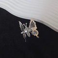 Eleganter silberner Schmetterlings-Haarclip mit hohlen Flügeln und Metallfeder - Silber