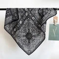 Elegant black and white paisley square scarf with vintage pattern hung on a black bar - 68x68cm / Black (68RZW151)