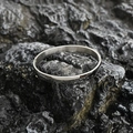 Polished silver titanium steel minimalist bangle with hinge clasp on black rock - Bright Large Style / Steel