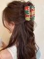 Christmas hair claw clip with Merry Xmas text decoration worn on wavy brown hair - Merry Xmas Letter Style