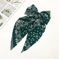 Vintage dark green paisley bow hair clip with long ribbons on a white surface - Spring Clip Style / Dark Green