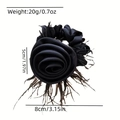 Eleganter schwarzer Rosen-Haargummi mit Federakzenten und 8 cm Größenabmessungen - Schwarz