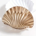 Elegante pinza per capelli a conchiglia oro champagne con glitter su vassoio bianco - Oro