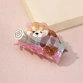 Detail view of red panda hair claw clip made of pearlescent acetate material - Red Panda