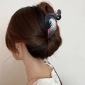 Elegante pinza per capelli a fenicottero in nero lucido e rosa sui capelli - Nero