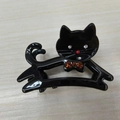 Funkelnde schwarze Katzen-Haarklammer mit orangefarbenen Steinchen und Hochglanz - Schwarz