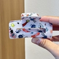Detail of white hair claw clip featuring colorful cartoon astronaut and space patterns - Space Astronaut / White Space Astronaut Style (3)
