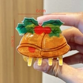 Detail view of a 6cm acetate Christmas bell hair claw clip with size measurements - Christmas Bell 1