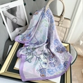 Elegant purple silk scarf with floral pattern draped on a beige handbag with satin borders - Lavender / 70*70cm