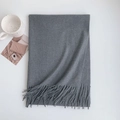 Detailed macro view of the soft grey faux cashmere scarf with elegant fringe tassels - 185x70cm / Dark Gray