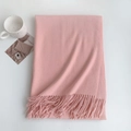 Detail of soft pink cashmere-feel winter scarf featuring delicate fringe edges and thick texture - 185x70cm / Light Pink