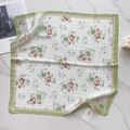 Detail of floral silk-feel 58cm square scarf with delicate green grid and pink blossoms - Green Edge Green Grid (58FJ94-3)