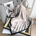 Chic beige silk scarf with black polka dots draped over a leather handbag - 70x70cm / Black