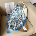 Elegant white square silk scarf with light blue border and vibrant handbag patterns - Blue