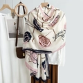 Elegant cream cotton scarf with pink rose print and Modern text on wooden hanger - Pink