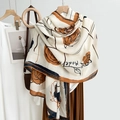 Floral cotton linen scarf with orange camellia print for sun protection and beach wear - Camel