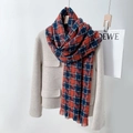 Thick red and blue houndstooth scarf with fringes for winter, shown on beige wool coat - 65*200cm / Brick Red