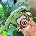 Pinza de pelo de garra de monstruo verde con ojo naranja para estilo de Halloween - Pinza de Pelo Verde