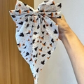 Detail of Halloween hair bow with orange pumpkin and spooky haunted house patterns - White Pumpkin Wizard House Style (2)