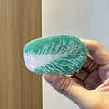 Detailed view of creative cabbage leaf hair claw clip with realistic white veins texture - Chinese Cabbage