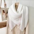 Elegant white square scarf with fringe tassels paired with a khaki winter wool coat - White