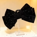 Elegante molletta per capelli in velluto nero con fiocco e strass argentati - Nero