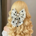 Elegante fermaglio per capelli a fiocco in rete con cuori neri e centro di strass - Stile Rete Cuore / Bianco