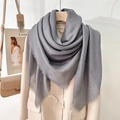 Minimalist grey scarf with fringe trim styled on a cream coat for winter fashion - Dusty Blue (130 Frayed Solid Color) / Standard