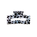 Détail d'une pince à cheveux rectangulaire ajourée au motif léopard blanc nacré - 8.5cm Rectangulaire Ajouré - Imprimé Vache