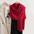 Elegant deep red linen blend scarf with long fringe details shown in a layered styling - New Jujube Red (53#)