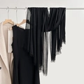 Elegant solid black cotton linen scarf with fringe edges hanging on a white rack - Black (24#)