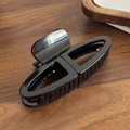 Glossy black large hair claw clip in a minimalist double-loop hollow design for thick hair - Black