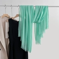 Elegant mint green cotton linen scarf with fringe edges hanging on a display - Aqua Green (19#)