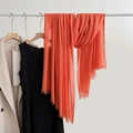 Coral red linen scarf hung on a white hanger with a minimalist outfit for spring - Orange (15#)