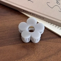 Elegant light gray flower hair claw clip with golden spring on a wooden desk - Small / Gray