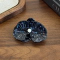 Elegante molletta orchidea nera in acetato con texture marmorizzata e perla - Nero Metallico