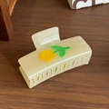 Creamy square hair claw clip featuring yellow 3D flower and green leaves design - Yellow