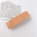 Rectangular hair clip featuring an orange and white checkerboard pattern in a retro style - Large / Orange Checkered