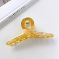 Französische Haarspange in Bernstein-Marmor-Optik mit großem gekreuztem Dreh-Design - Wassergelb - 10.5cm