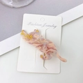 Pink marble acetate hair clip in cute cat shape displayed on jewelry card - Iridescent Yellow
