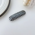 Classic black and white checkered oval hair clip with a high-gloss polished finish - Spring Clips / Black and White Plaid