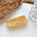 France hair claw clip in amber tortoiseshell acetate finish with gold lettering - Beige