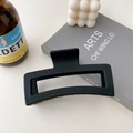 Matte black large square hair claw clip for women in a minimalist lifestyle setting - Black (13cm)