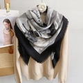 Detail of artistic horse print square shawl with soft fringe on a cream knit sweater - 130x130cm / Black