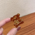 Mini amber tortoiseshell bear hair claw clip with golden Creation France lettering - Brown